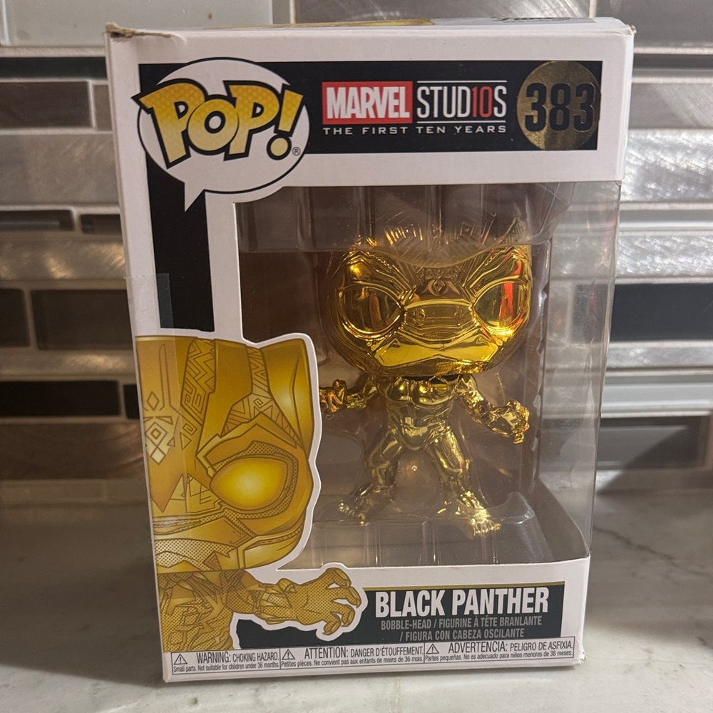 Funko Pop Marvel Black Panther Gold Figure 10th anniversary.